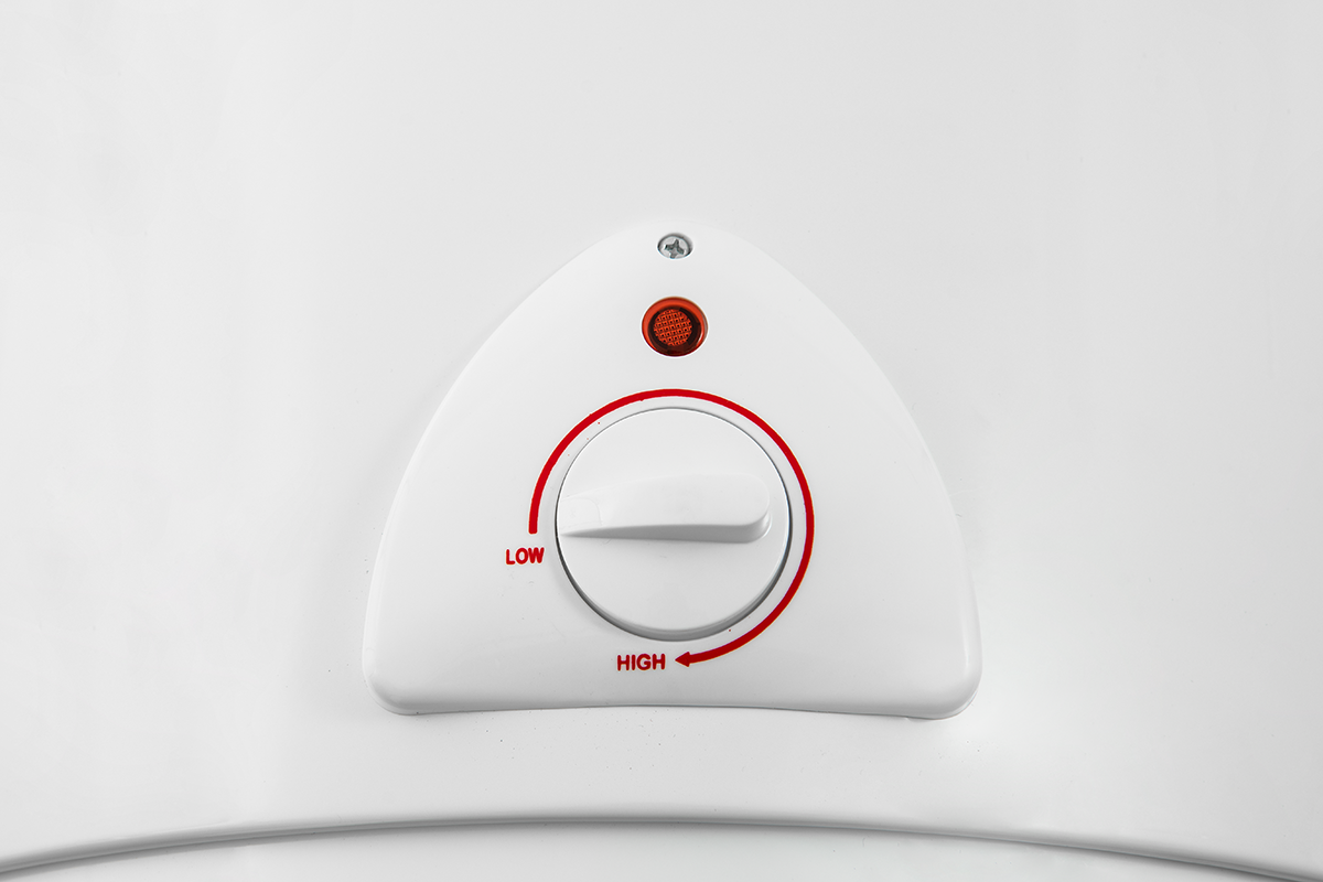 A white Canon water heater thermostat dial (LY-02.png) with a red indicator, labelled “LOW” and “HIGH,” on a white background. The dial points towards LOW, offering precise control for your electric water heater.