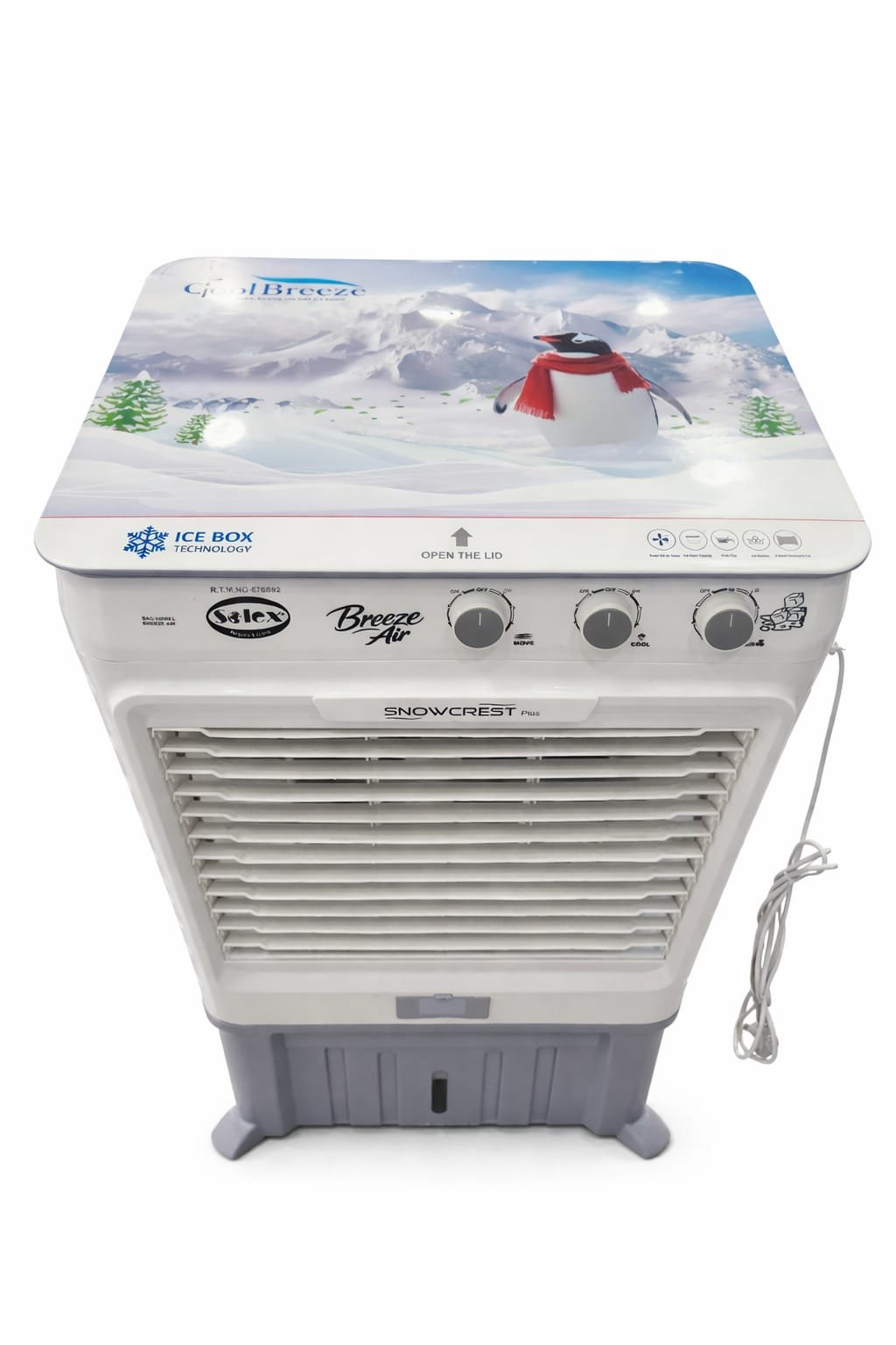 The white Solex SAC-14000-L 02 air cooler features control knobs, a lid with a snowy mountain, penguin, and trees design, plus a side power lead.